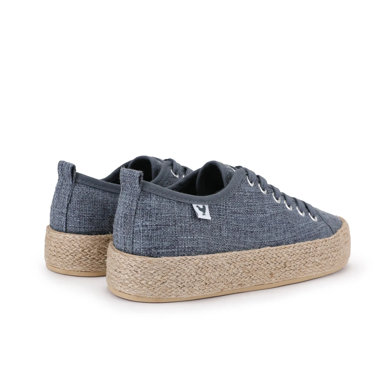 Blue lace-up espadrille sneakers made of linen.