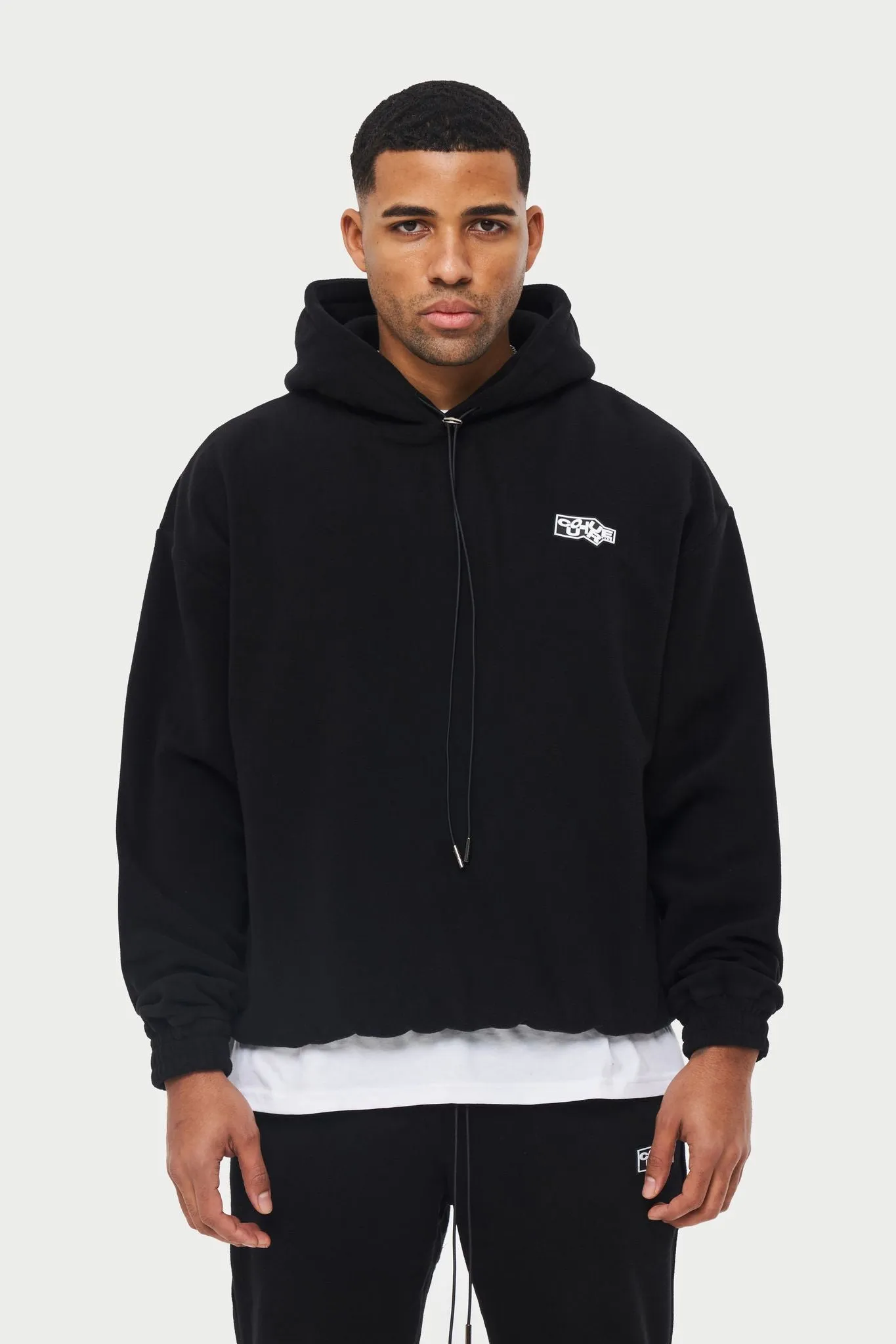 POLAR FLEECE RUBBER BADGE TRACKSUIT HOODIE - BLACK