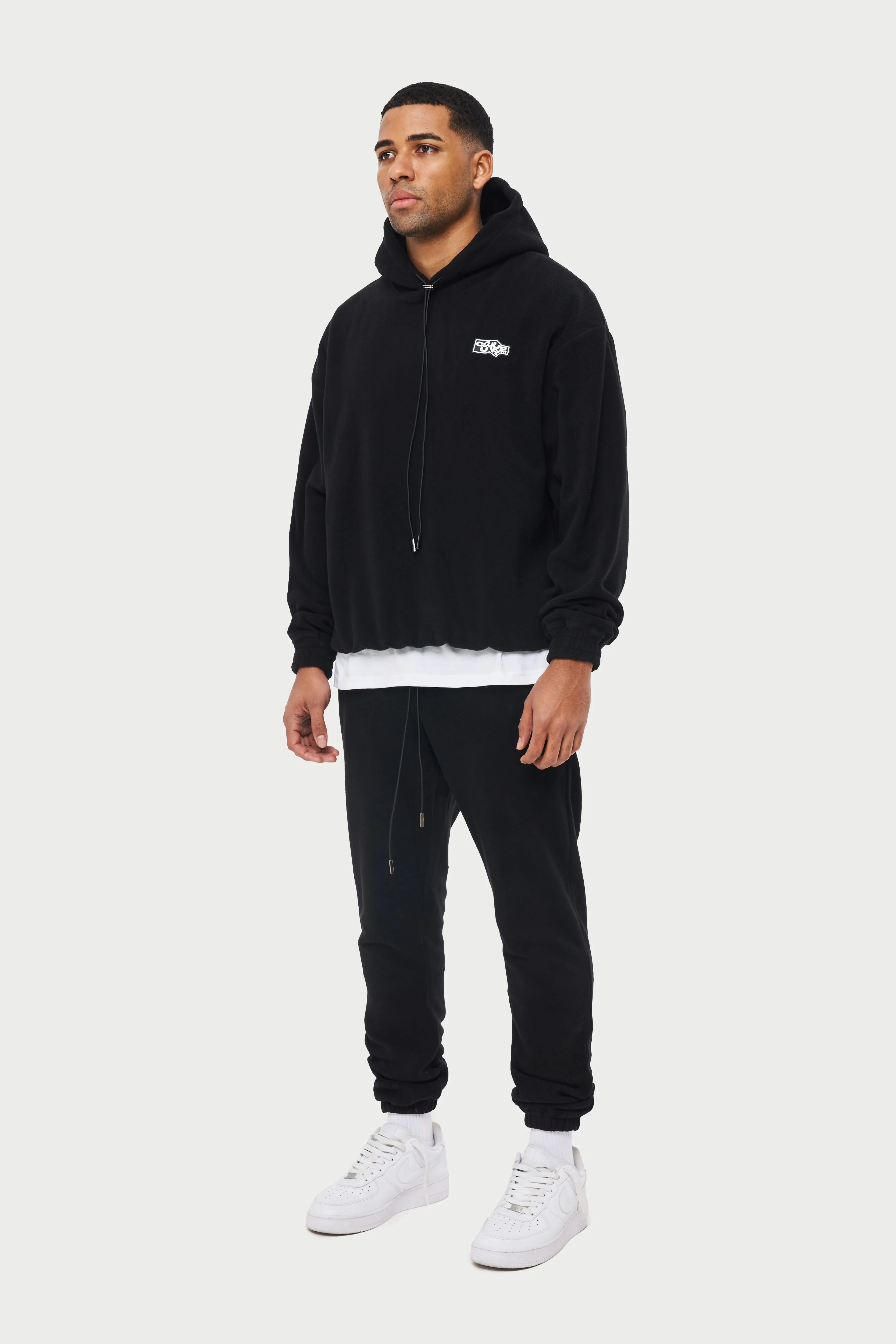 POLAR FLEECE RUBBER BADGE TRACKSUIT HOODIE - BLACK