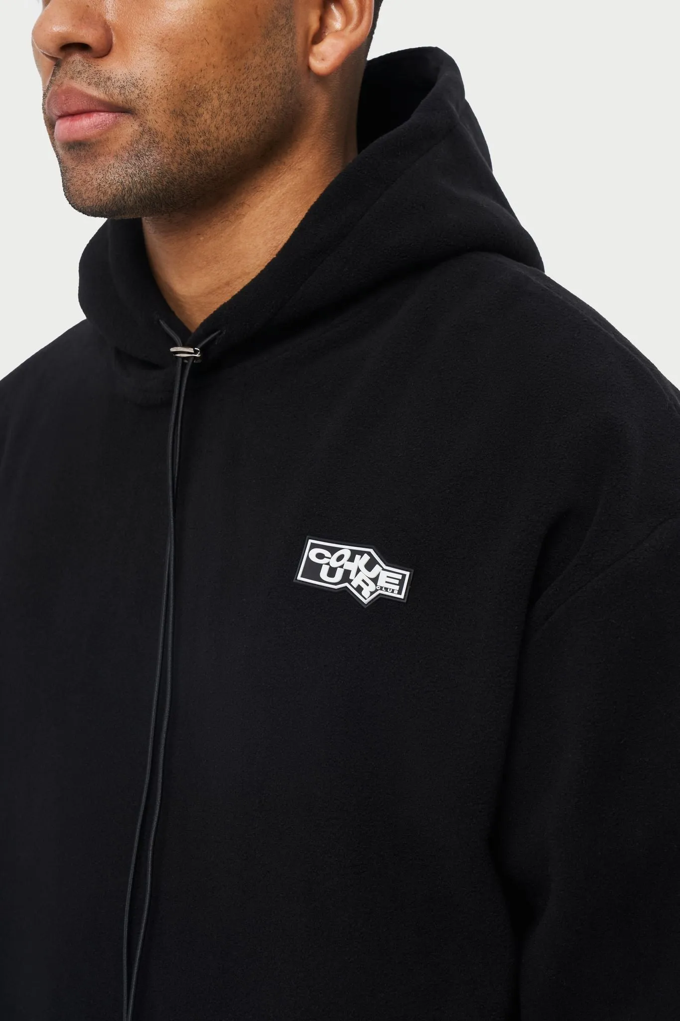 POLAR FLEECE RUBBER BADGE TRACKSUIT HOODIE - BLACK