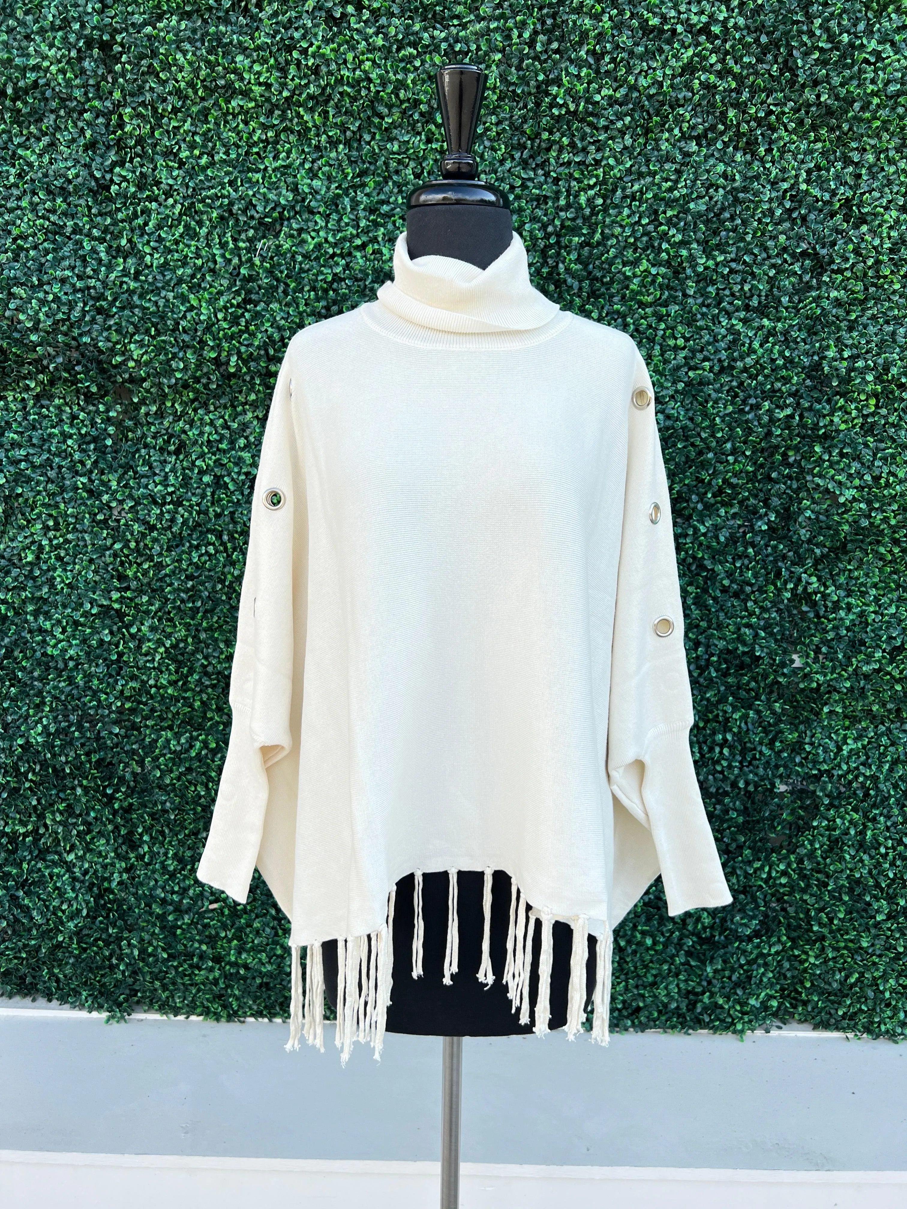 Turtleneck Poncho - Grommet Detail
